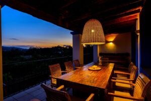 Luxury villa in Morna Valley, Santa Eulalia with 5 bedrooms, pool, Balinese bed, lush garden, and fruit trees, ideal for long-term rental in Ibiza.