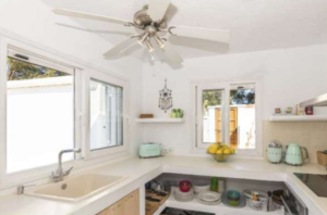 Modern fully equipped kitchen at Casa Nashamena in San Miguel, Ibiza, featuring luxury appliances and elegant design.