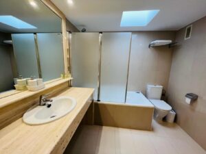 Luxurious en-suite bathroom in Talamanca Penthouse with modern design and high-end finishes.