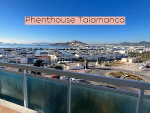 Panoramic exterior view of Talamanca Penthouse with stunning sea and Dalt Vila views.