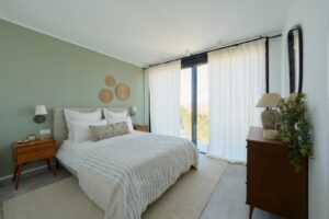 Elegant master bedroom in Luxury Villa Jesús, Ibiza, featuring a spacious design, premium bedding, and natural light.