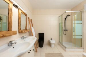Luxurious bathroom at Luxury Casa Flamenc, Ibiza, featuring elegant design, premium fixtures, and a spacious, modern shower.