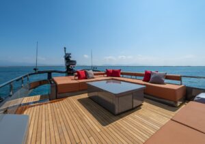Luxury aft deck entertainment area on AB 80 superyacht with tender garage