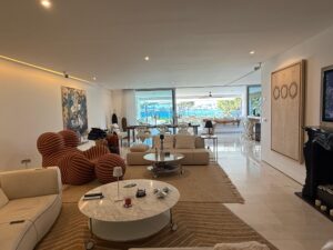 Open plan loft style living area kitchen dining room at Es Pouet Talamanca Ibiza property