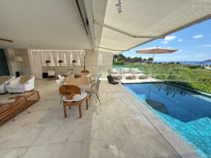 Infinity pool terrace at Es Pouet Talamanca with panoramic Dalt Vila and Mediterranean Sea views
