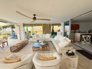 Open plan loft style living area kitchen dining room at Es Pouet Talamanca Ibiza property