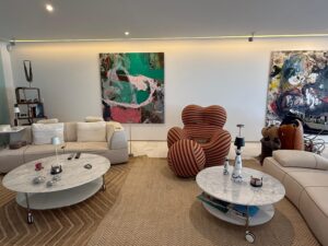Open plan loft style living area kitchen dining room at Es Pouet Talamanca Ibiza property