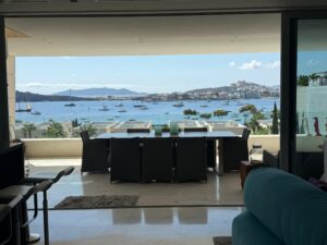 Modern loft-style open living area with sea views at Penthouse Es Pouet Talamanca