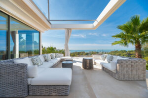 Infinity edge swimming pool at luxury Ibiza villa with Dalt Vista and sea panorama