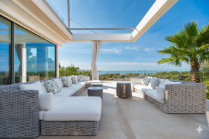 Infinity edge swimming pool at luxury Ibiza villa with Dalt Vista and sea panorama