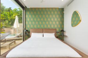 11. Master bedroom suite with king bed and sea views in Cap Martinet luxury villa