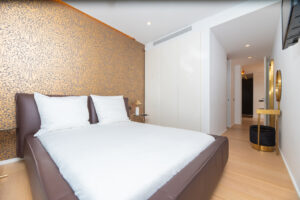 11. Master bedroom suite with king bed and sea views in Cap Martinet luxury villa