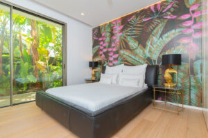 11. Master bedroom suite with king bed and sea views in Cap Martinet luxury villa