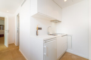 Guest bedroom with terrace access and modern design in Cap Martinet villa